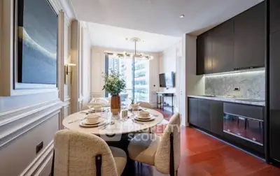 Luxurious dining area with elegant decor and modern kitchen in a high-rise apartment.