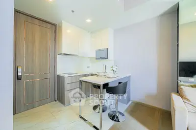 Modern kitchen with sleek design and breakfast bar in a stylish apartment