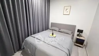 Modern bedroom with stylish gray decor and cozy ambiance
