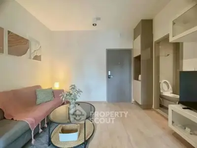 Modern living room with cozy sofa and stylish decor