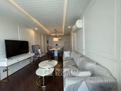 Luxurious living room with modern decor, stylish furniture, and elegant lighting in a spacious apartment.