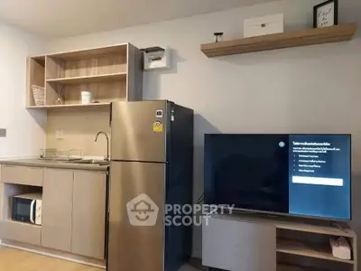 Modern kitchen with sleek appliances and stylish shelving