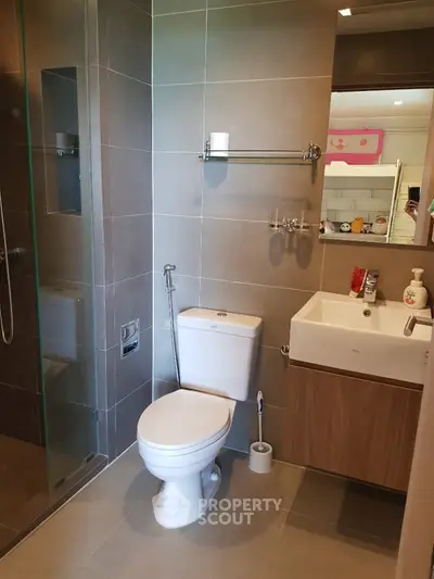 Modern bathroom with sleek design and glass shower enclosure