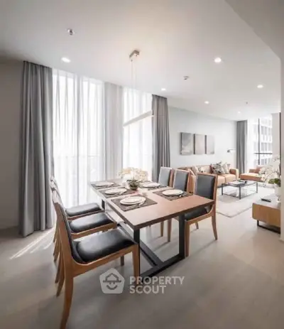 Spacious modern living room with elegant dining area and natural light
