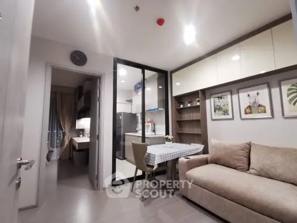 Modern apartment interior with cozy living area and stylish kitchen