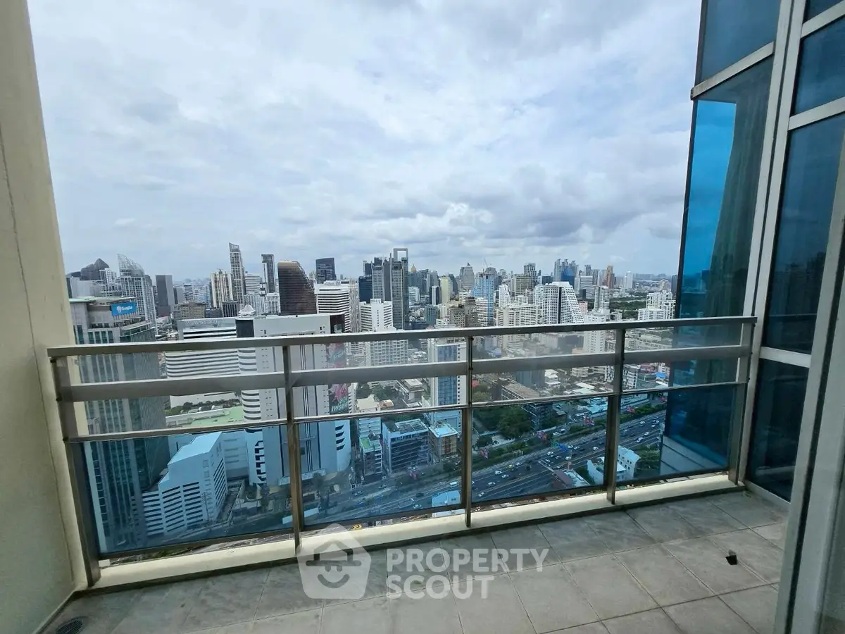 Stunning cityscape view from a high-rise balcony, perfect for urban living.