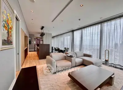 Luxurious modern living room with panoramic city views and elegant decor