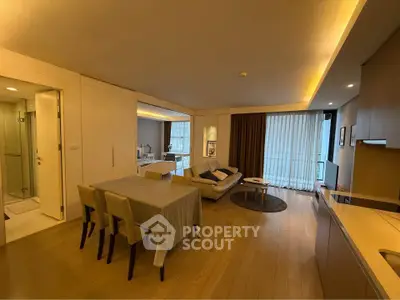 Spacious modern living room with dining area and open kitchen layout