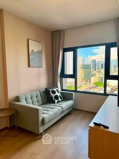 Modern living room with city view, featuring a stylish sofa and large window.