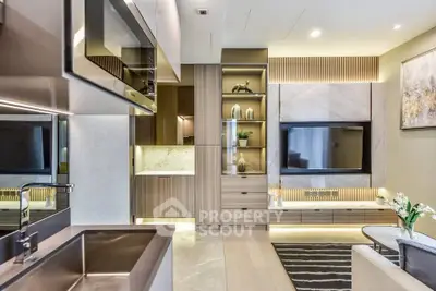 Modern living room with sleek design and integrated kitchen appliances.