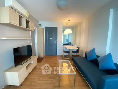 Modern living room with sleek furniture and ambient lighting