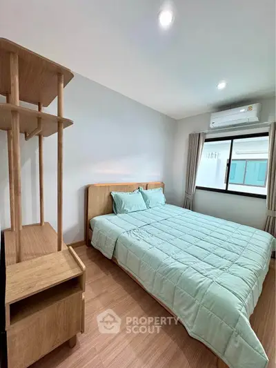 Cozy bedroom with modern wooden furniture and natural light