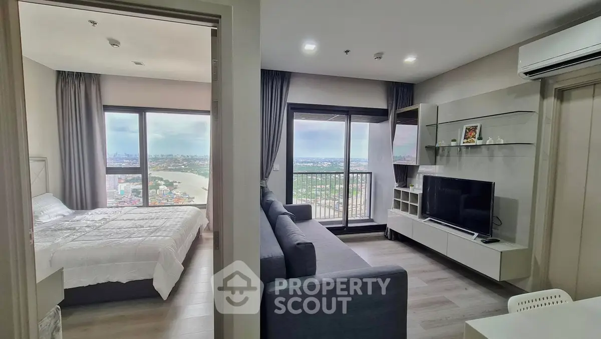 Modern apartment with stunning city view, spacious living room, and cozy bedroom.