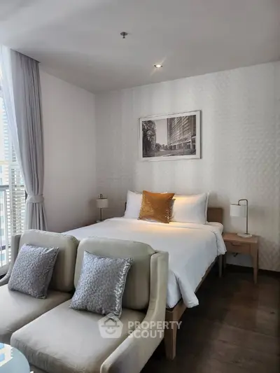 Modern bedroom with elegant decor and city view from large window