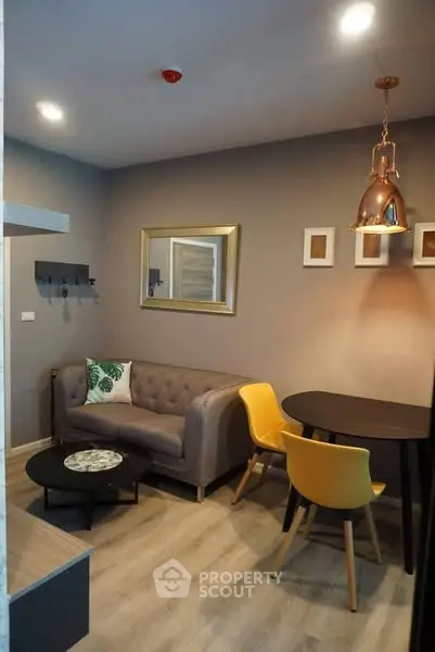 Chic modern living room with stylish furniture and warm lighting