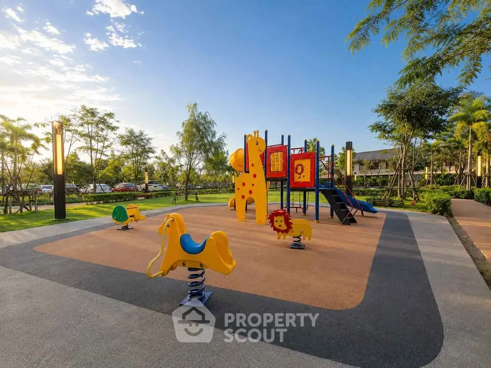 Vibrant playground in a lush residential community park, perfect for family-friendly living.