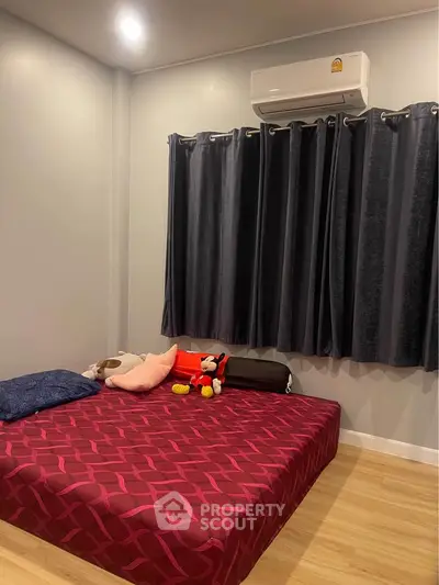 Cozy bedroom with modern decor and air conditioning