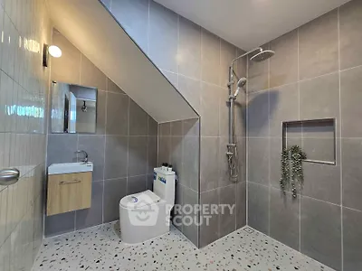 Modern bathroom with sleek design and spacious shower area
