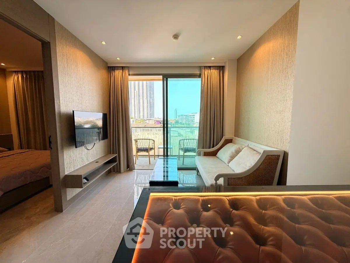Modern living room with balcony view in luxury apartment