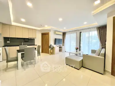 Spacious modern living room with open kitchen and elegant decor
