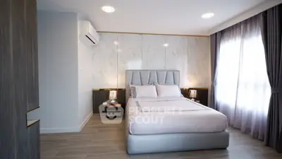 Modern bedroom with elegant decor and natural light