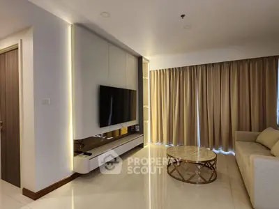 Modern living room with sleek design and ambient lighting