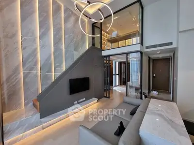 Luxurious modern living room with high ceilings and elegant lighting