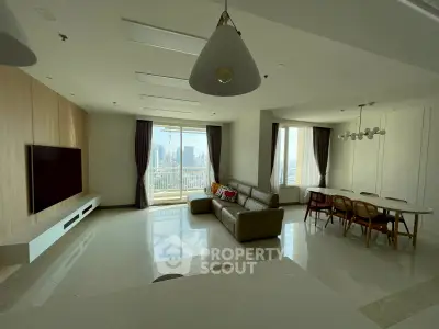 Spacious modern living room with city view and elegant dining area