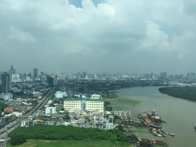 Stunning cityscape view with river and skyline, perfect for urban living enthusiasts.