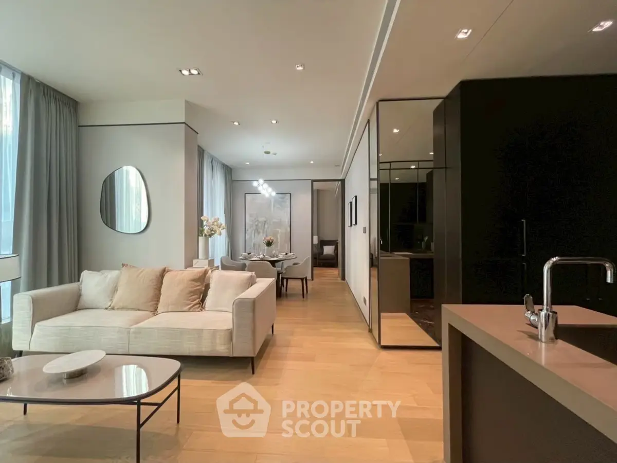 Luxurious modern living room with open kitchen and elegant decor