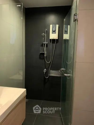 Modern bathroom with sleek shower design and glass enclosure
