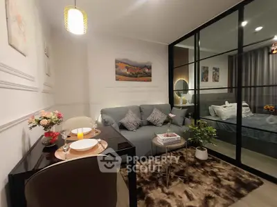 Stylish modern living room with cozy seating and elegant dining area.