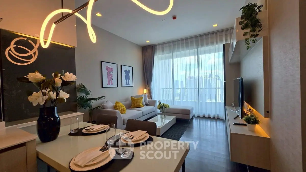 Modern living room with stylish decor and city view, perfect for urban living.