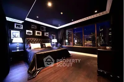 Luxurious bedroom with city skyline view and elegant decor
