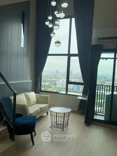 Stunning high-rise living room with floor-to-ceiling windows and panoramic city views.
