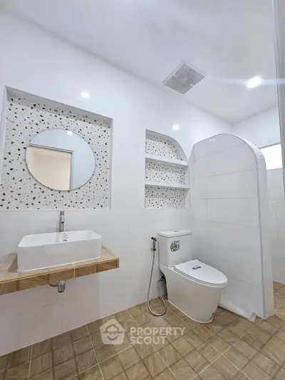 Modern bathroom with stylish tiles and sleek fixtures