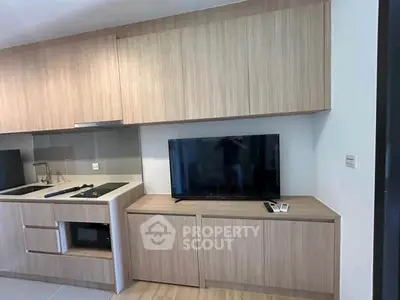 Modern kitchen with sleek cabinetry and built-in appliances