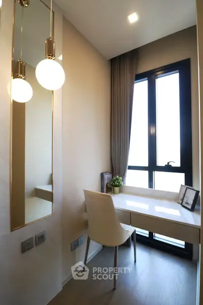 Elegant study nook with modern desk and chair by large window, perfect for productivity and inspiration.