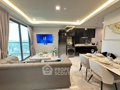 Luxurious modern living room with open kitchen and stunning city view