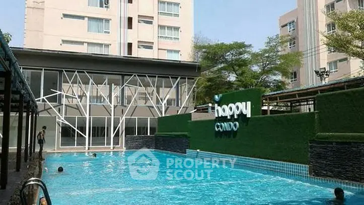 Modern condo with outdoor pool and stylish architecture in vibrant urban setting.