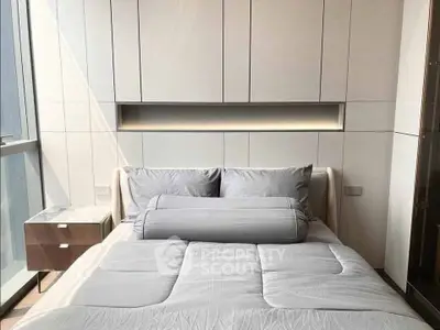 Modern bedroom with sleek design and natural light