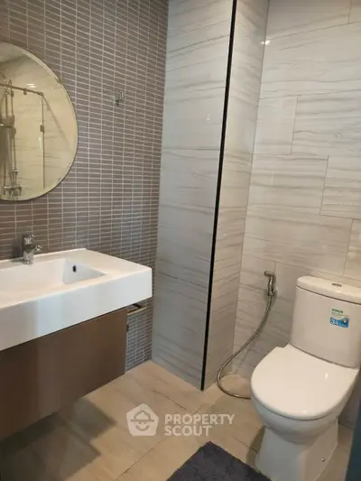 Modern bathroom with sleek fixtures and stylish tile design