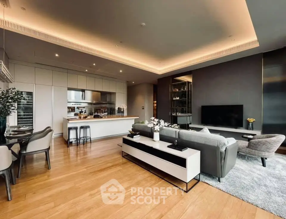 Luxurious open-plan living room with modern kitchen and elegant decor