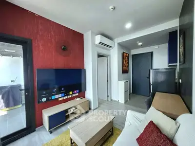 Modern living room with stylish decor and balcony access