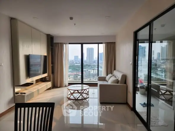 Modern living room with city view, sleek furniture, and large windows.