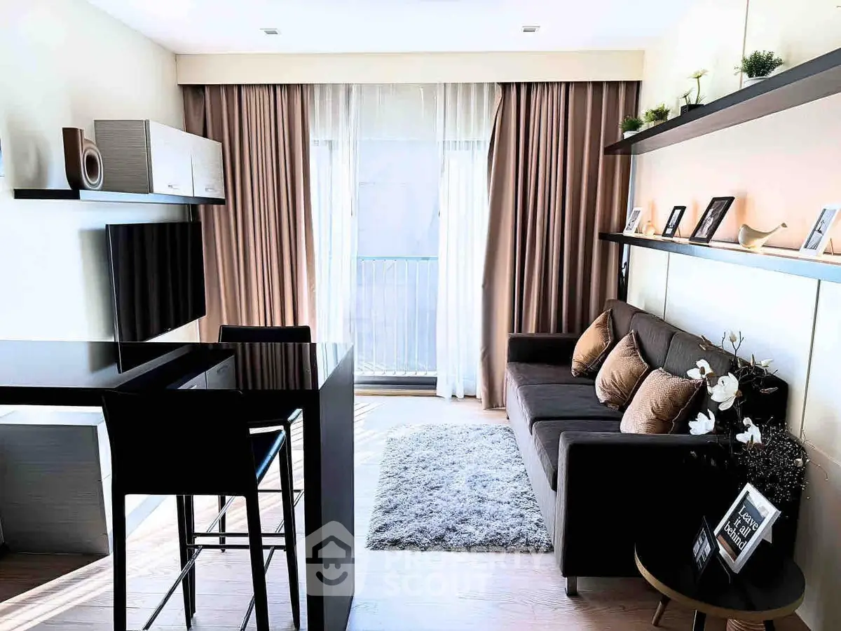 Modern living room with sleek furniture and natural light, perfect for urban living.