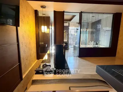 Luxurious modern living room with elegant decor and stylish lighting