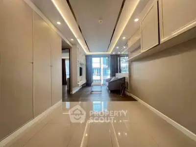 Spacious modern living room with sleek design and ample natural light