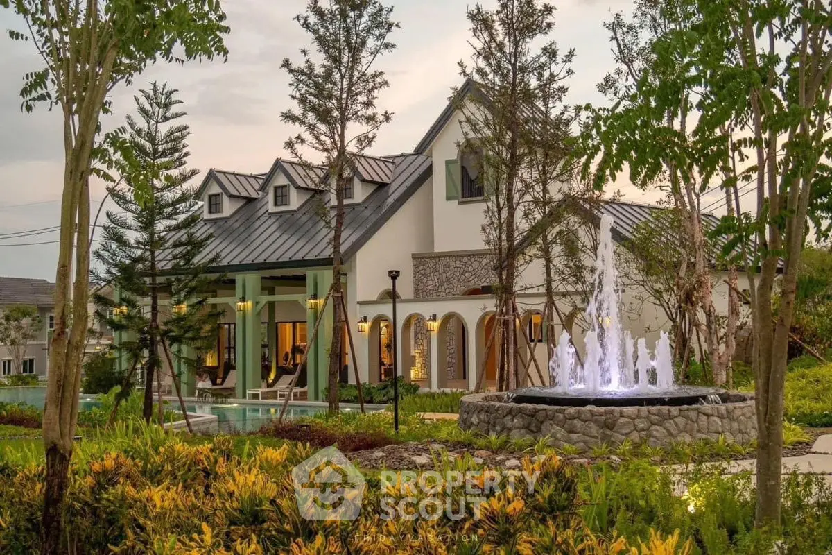 Charming countryside home with lush garden and elegant water fountain