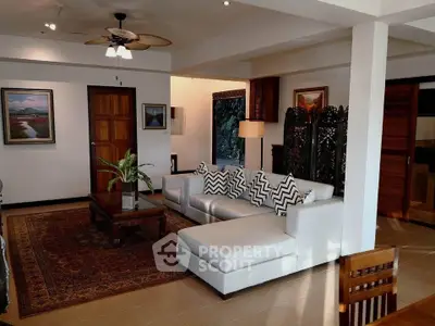 Spacious living room with elegant decor and natural lighting in modern home
